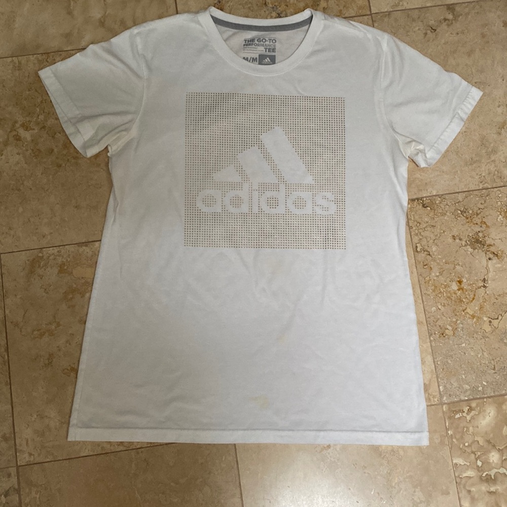 Adidas Size M. White with Gold design.